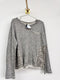 Buzo gris con lentejuelas