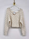 Suéter cropped crema