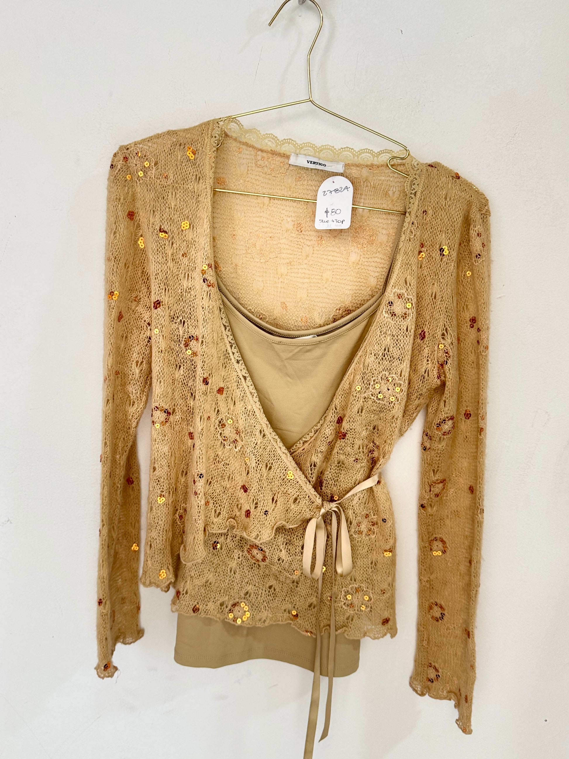 Set suéter con lentejuelas + blusa