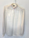 Blusa satinada color marfil