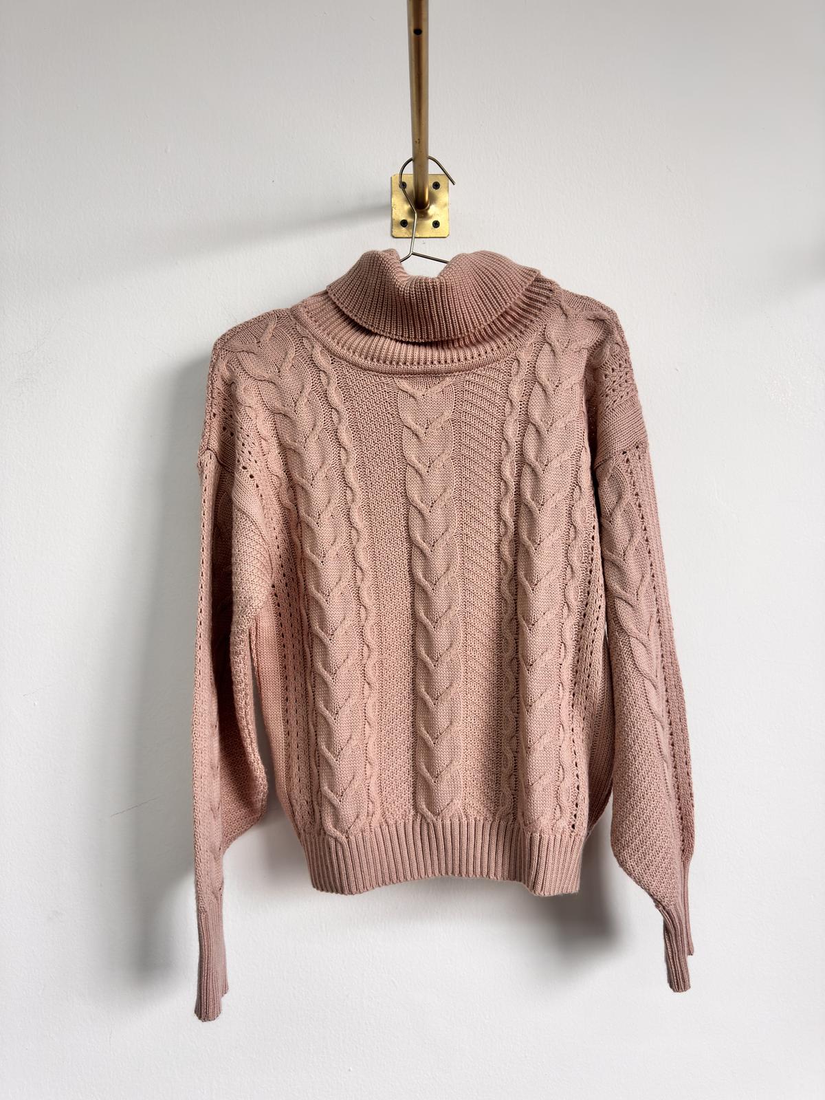 Suéter tejido cuello alto rosa
