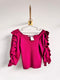 Suéter fucsia con volantes ZARA