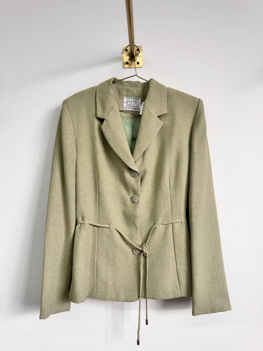 Blazer formal en tono verde