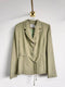 Blazer formal en tono verde