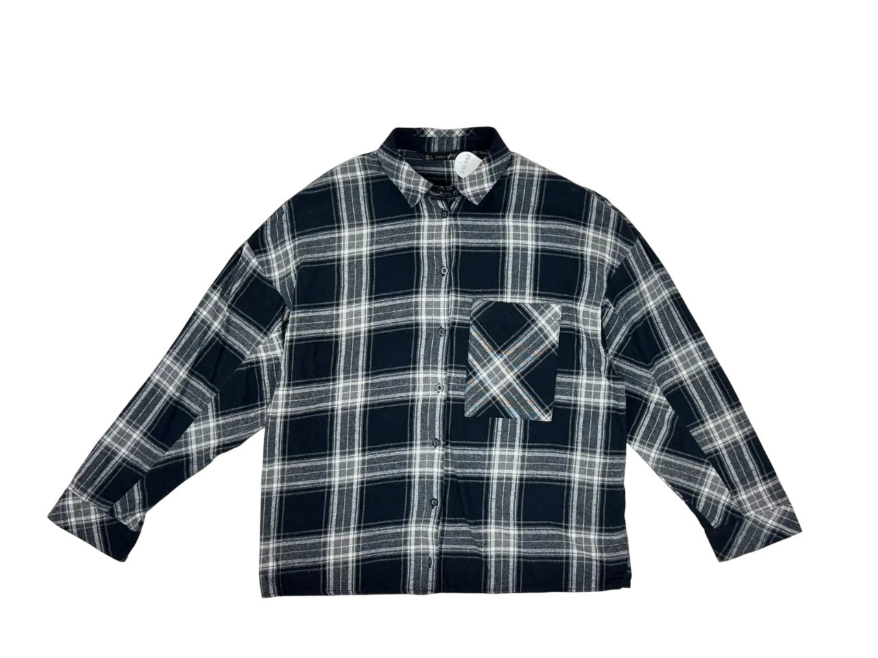 Blusa de cuadros en tonos negro y blanco