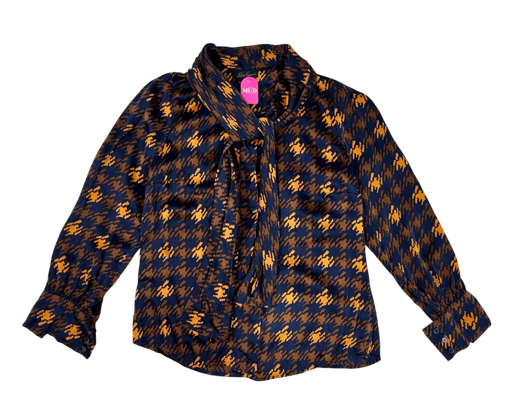 Blusa estampada azul y mostaza con lazo en el cuello
