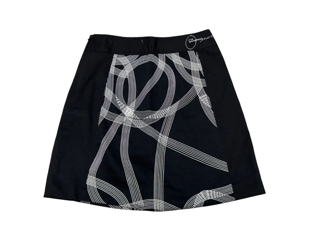 Falda negra con estampado abstracto y flor bordada DESIGUAL